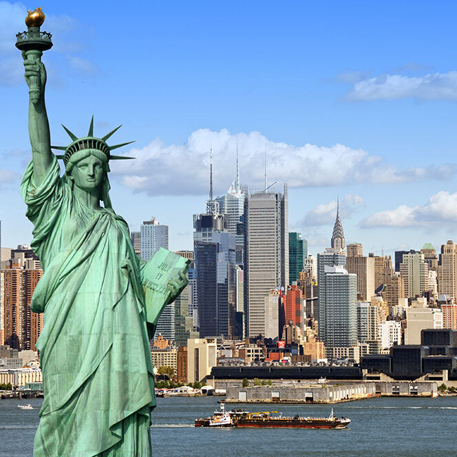 New,York,City,Skyline,Cityscape,With,Statue,Of,Liberty,Over new york city skyline cityscape with statue of liberty over hudson river. with midtown Manhattan skyscrapers and freight sailing ship in usa america.